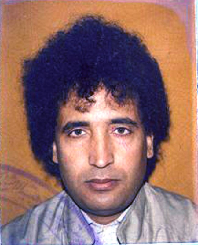 In a photo released by the Crown Office, Lockerbie bomber Abdel Basset al-Megrahi, the Libyan man who was convicted of the deadly 1988 bombing of Pan Am Flight 103, is shown in his passport picture on August 20, 2009. Al-Megrahi, diagnosed with terminal cancer, was released today by Scottish officials on compassionate grounds and returned to Libya. UPI/Crown Office