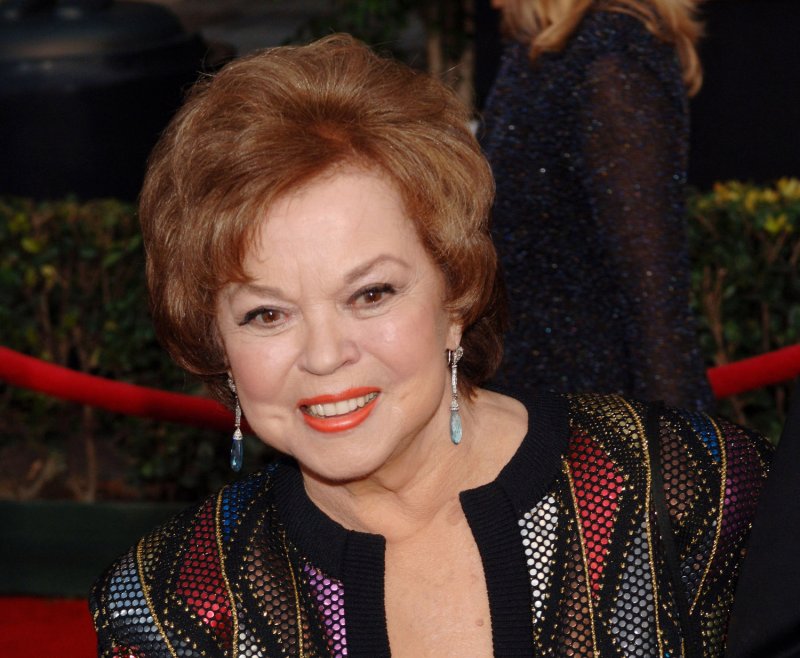 Actress Shirley Temple Black arrives for the 12th annual Screen Actors Guild Awards where she will receive the Screen Actors Guild's Life Achievement Award in Los Angeles, California January 29, 2006. The award will honor her years not only as a child star, but as a diplomat and humanitarian. (UPI Photo/Jim Ruymen).. | <a href="/News_Photos/lp/c970d4e26b41cba1721205756bcae91a/" target="_blank">License Photo</a>