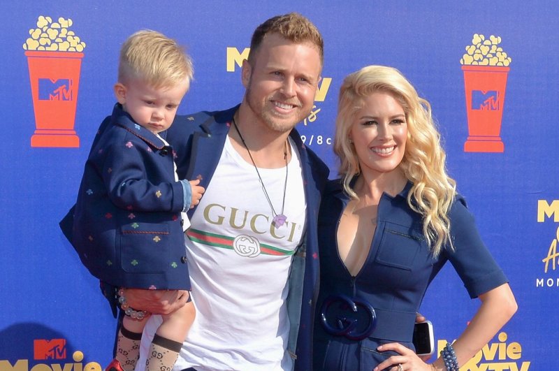 Heidi Montag (R) and Spencer Pratt (C), pictured with son Gunner, are expecting their second child after fertility struggles. File Photo by Jim Ruymen/UPI