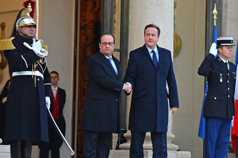 French President Francois Hollande (L) greets British Prime Minister David Cameron at the Elysee Palace in Paris on November 23, 2015. The two leaders discussed security co-operation and intelligence sharing in light of the recent terrorist attack in the city. Photo by David Silpa/UPI | <a href="/News_Photos/lp/4381c3debc0225dbfe4345a845ba08c6/" target="_blank">License Photo</a>
