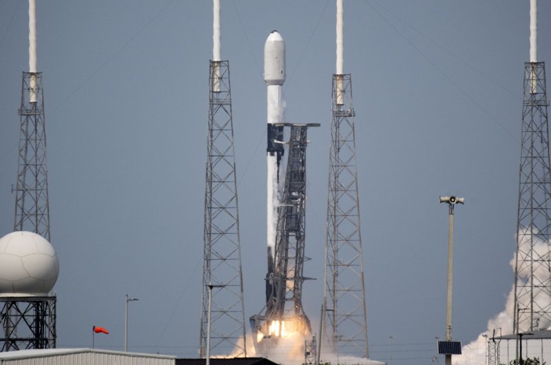 SpaceX has delayed the launch of a Falcon 9, like the one shown here preparing to carry Starlink satellites on March 29, for the second time in two days. The new launch is scheduled for Saturday. Photo by Joe Marino/UPI