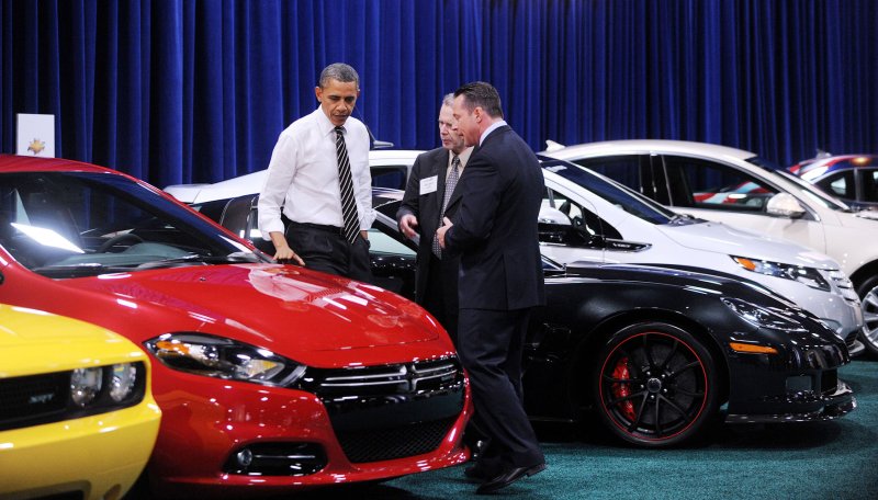 U.S. President Barack Obama looks at cars during a visit to the DC Auto Show at the Convention Center on January 31, 2012 on Washington, DC. UPI/Olivier Douliery/Pool