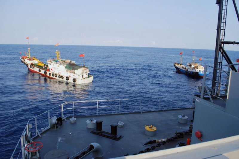 Two Chinese trawlers stop directly in front of the military Sealift Command ocean surveillance ship USNS Impeccable (T-AGOS-23), forcing the ship to conduct an emergency "all stop" in order to avoid collision in the much disputed South China Sea. The trawlers came within 25 feet of Impeccable, as part of an apparent coordinated effort to harass the unarmed ocean surveillance ship. File Photo U.S. Navy/UPI