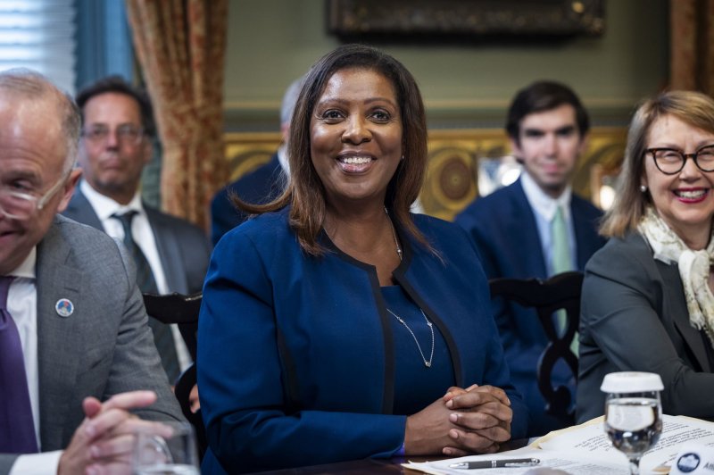 New York Attorney General Letitia James (C) said in a Friday court filing that former President Donald Trump has inflated his net worth by as much as $3.6 billion a year since 2011. A civil lawsuit James filed against Trump is scheduled to be tried Oct. 2. File Photo by Jim Lo Scalzo/UPI