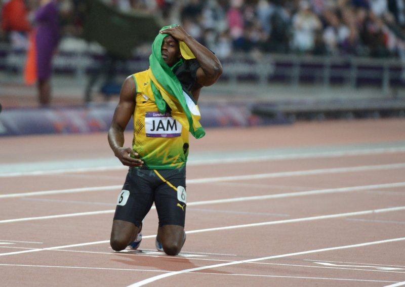 Usain Bolt of Jamaica celebrates the Jamaican win of the Men's 4 x 100M relay at the London 2012 Summer Olympics on August 11, 2012 in London. The Jamaican team won the gold with a world record of 36.84 seconds. UPI/Terry Schmitt