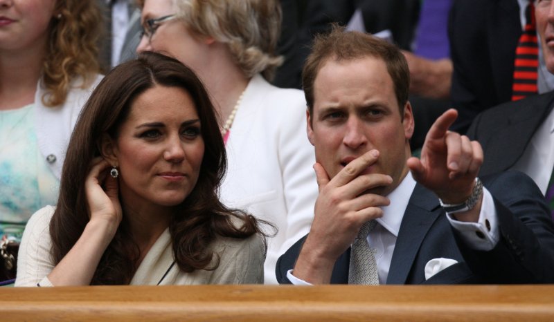 The Duke and Duchess of Cambridge enjoy the tennis in the Royal Box on the ninth day of the 2012 Wimbledon championships in London, July 4, 2012. UPI/Hugo Philpott