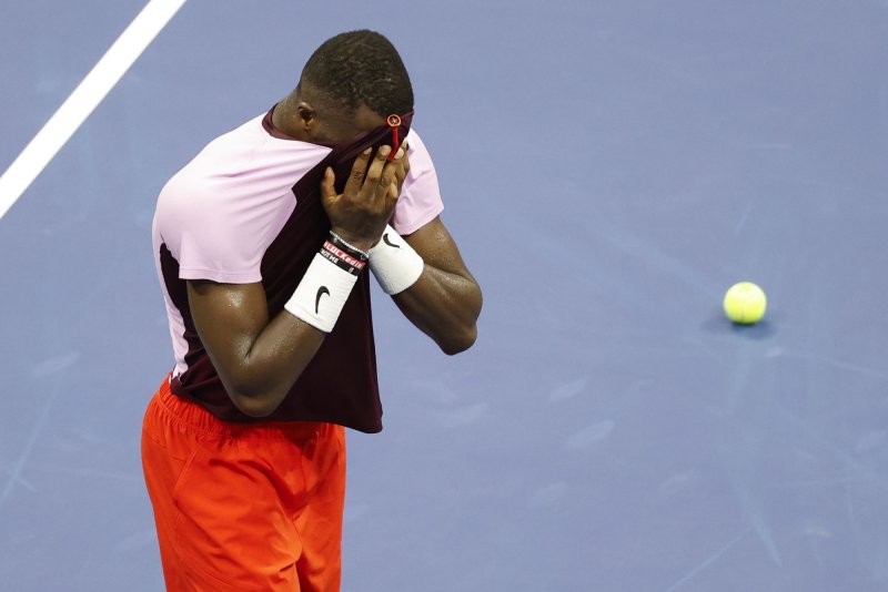 American Frances Tiafoe celebrates after defeating No. 2 seed Rafael Nadal of Spain in four sets in Arthur Ashe Stadium at the USTA Billie Jean King National Tennis Center in New York City on Monday. Photo by John Angelillo/UPI | <a href="/News_Photos/lp/e321403a7e41dfe53d33f2feff73f033/" target="_blank">License Photo</a>