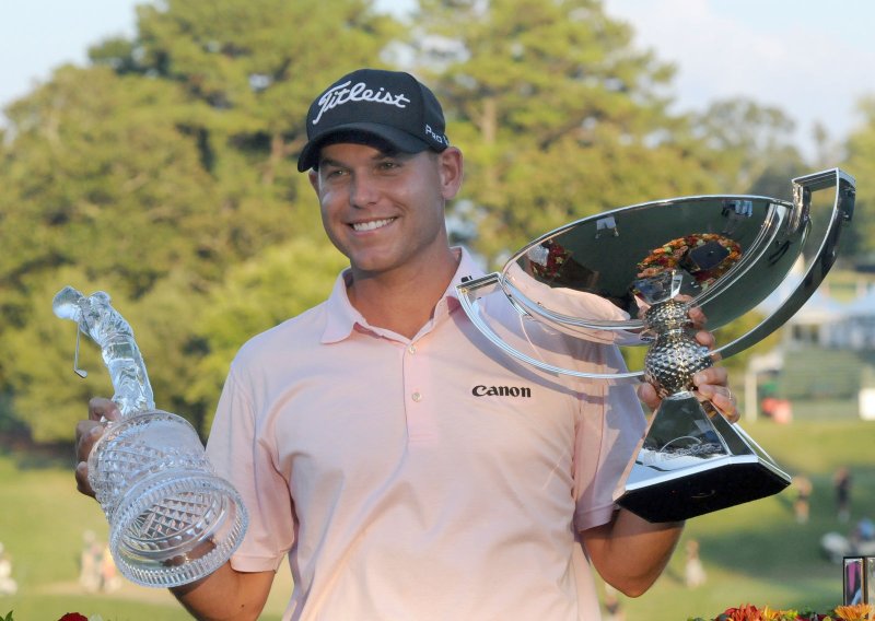 Haas wins Tour Championship, FedEx Cup