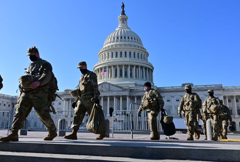 Military personnel patrol near the U.S. Capitol on Thursday in Washington, D.C., amid increased security efforts during preparations for President-elect Joe Biden's presidential inauguration scheduled for January 20. Photo by David Tulis/UPI