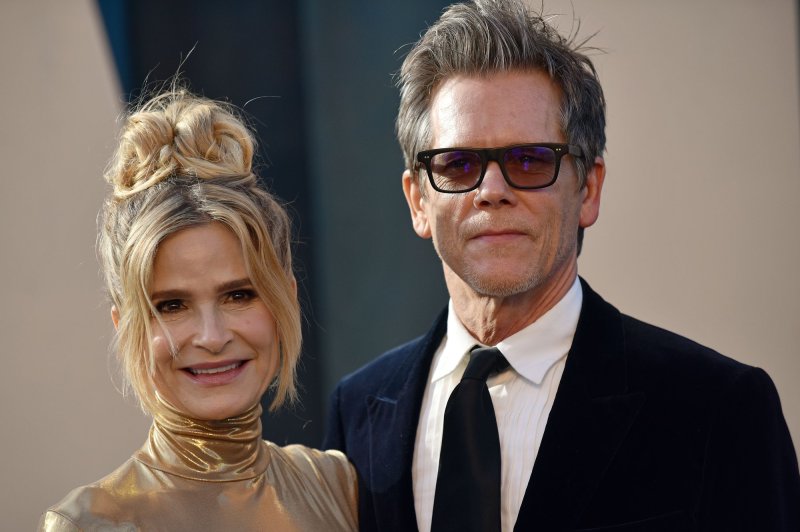 Kevin Bacon (R), pictured with Kyra Sedgwick, and Jimmy Fallon performed a new version of Tears for Fears' hit song "Head Over Heels" on "The Tonight Show." File Photo by Chris Chew/UPI