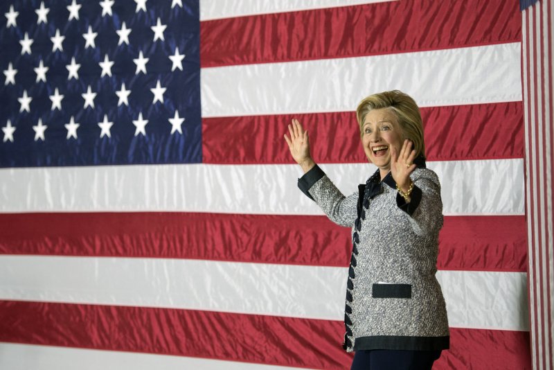 Democratic presidential candidate Hillary Clinton arrives on stage to deliver remarks at a campaign event in Pittsburgh on June 14. Her campaign released a list of more than 50 executives from the business world who are endorsing her. Photo by Kevin Dietsch/UPI
