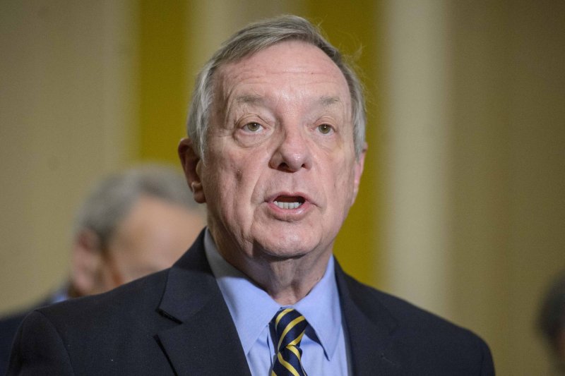 Sen. Dick Durbin, D-Iii., speaks during a press conference at the U.S. Capitol on December 6. He announced a new bill that would expand U.S. war crime jurisdictions. Photo by Bonnie Cash/UPI