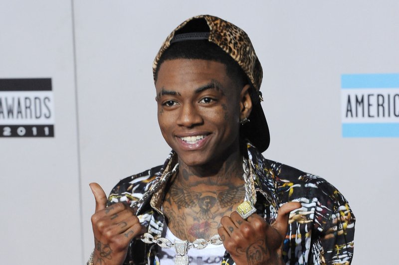 Soulja Boy arrives at the 39th American Music Awards on November 20, 2011. Soulja Boy and Chris Brown are feuding on social media over Brown's ex Karrueche Tran. File Photo by Jim Ruymen/UPI