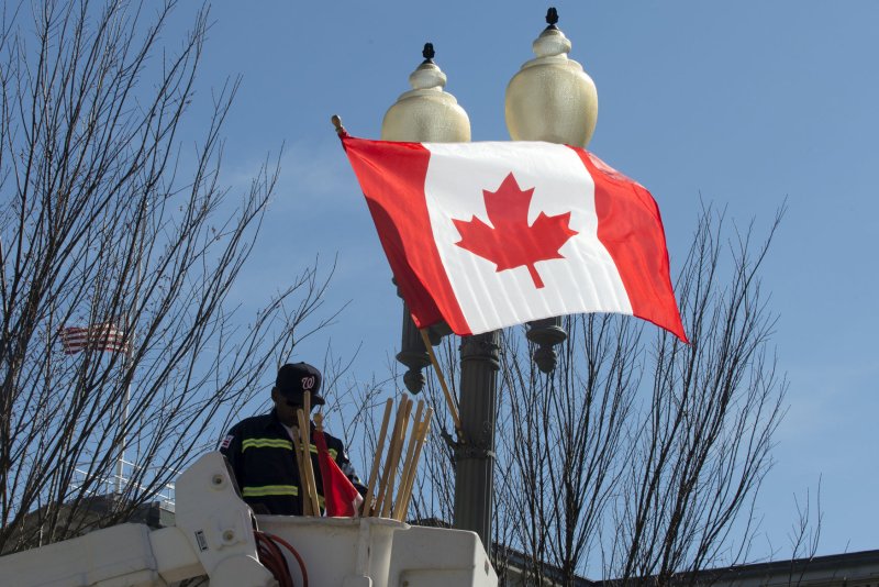 The Canadian Flag is put up on the street in front of the White House on Monday, March 7, 2016 in anticipation of the State Visit by Canadian Prime Minister Justin Trudeau on Thursday, March 12, 2016. Photo by Pat Benic/UPI