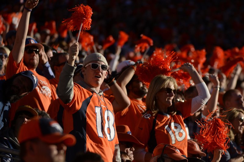 Broncos fans go crazy during the AFC Championship game at Sports Authority Field at Mile High in Denver on January 19, 2014 (File/UPI/Jamie Schwaberow) | <a href="/News_Photos/lp/c71ceed91416d6e93c88086cb98928e6/" target="_blank">License Photo</a>
