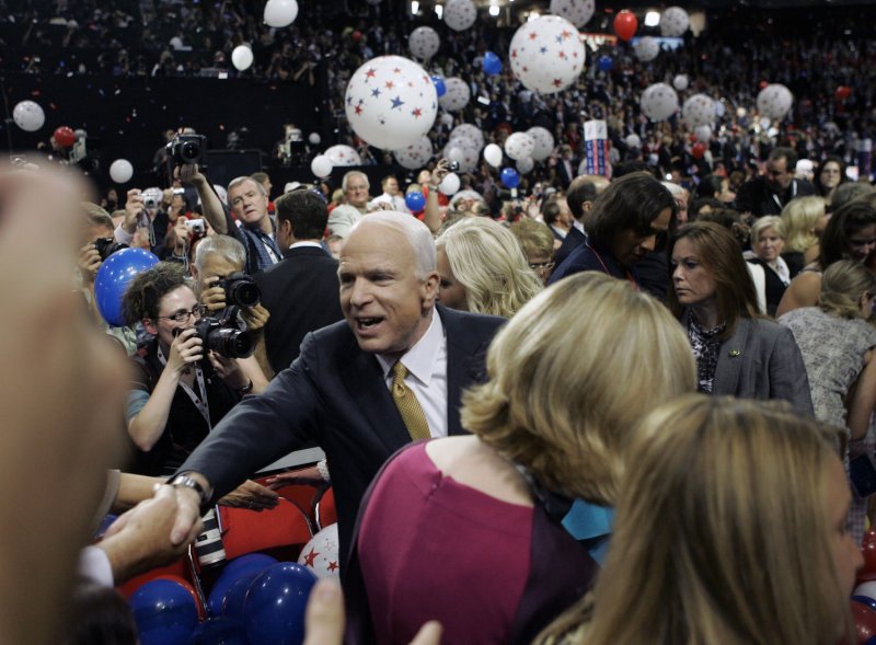 Republican Presidential candidate Sen. John McCain (R-AZ) (C) greets delegates after he spoke on the last day of the Republican National Convention at the Xcel Energy Center in St. Paul, Minnesota on Sept. 4, 2008. (UPI Photo/Brian Kersey) | <a href="/News_Photos/lp/3606a72ae5f6967afba0f4a59b65e14d/" target="_blank">License Photo</a>