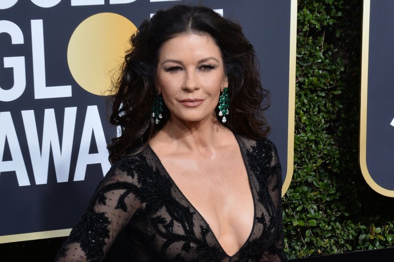 Catherine Zeta-Jones steps out with lookalike daughter Carys.