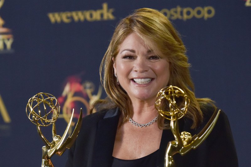Valerie Bertinelli holds up her Daytime Emmys for Outstanding Culinary Host and Outstanding Culinary Program backstage in the press room at the 46th Annual Daytime Emmy Awards held at the Pasadena Civic Auditorium in 2019. File Photo by Chris Chew/UPI