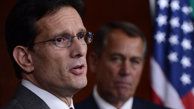 House Majority Leader Eric Cantor (R-VA) speaks alongside Speaker of the House John Boehner (R-OH) during a press conference after President Obama met with the House Republican Conference on Capitol Hill on March 13, 2013 in Washington, D.C. UPI/Kevin Dietsch