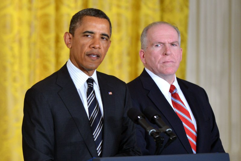 President Barack Obama delivers remarks alongside CIA Director John Brennan during Brennan's nomination in 2012. (UPI/Kevin Dietsch)