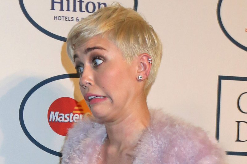 Miley Cyrus's 'Bangerz' tour not cancelled for being a 'porn show'