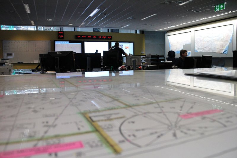 This photo released by the Australian Maritime Safety Authority on March 20, 2014 shows Search and Rescue Officers coordinating the search for missing Malaysia Airlines flight 370 in their Rescue Coordination Centre in Canberra, Australia. (UPI/Australian Maritime Safety Authority)