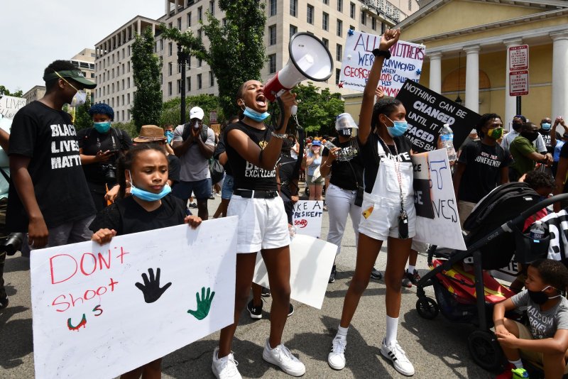 Protesters gather at the historic St. John's Episcopal Church on June 6, less than a week after U.S. and military police drove protesters out of Lafayette Square. File Photo by Pat Benic/UPI