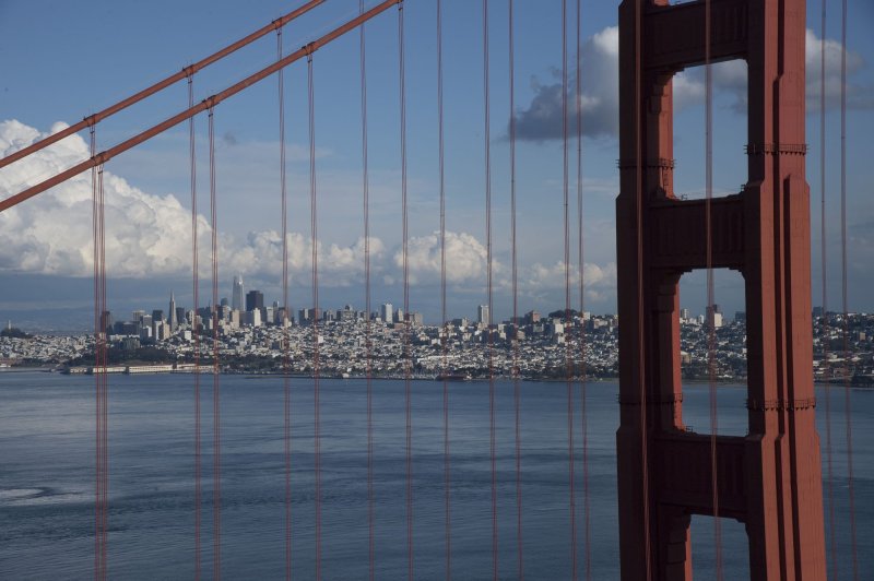 Clouds are seen over the Golden Gate Bridge and downtown San Francisco, Calif. File Photo by Terry Schmitt/UPI