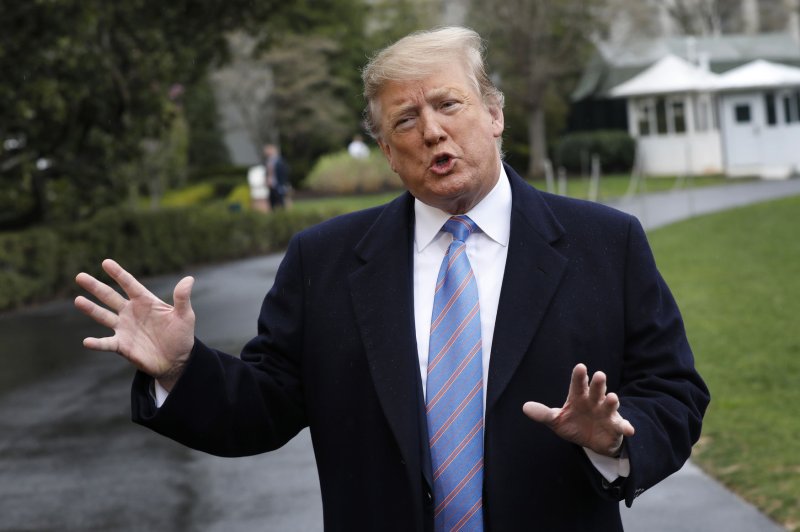 U.S. President Donald Trump speaks to the media on the South Lawn of the White House in Washington before his departure to El Centro, California on April 5, 2019. Photo by Yuri Gripas/UPI | <a href="/News_Photos/lp/ec9cfba3df84a73bafab2e34f76fdbb9/" target="_blank">License Photo</a>