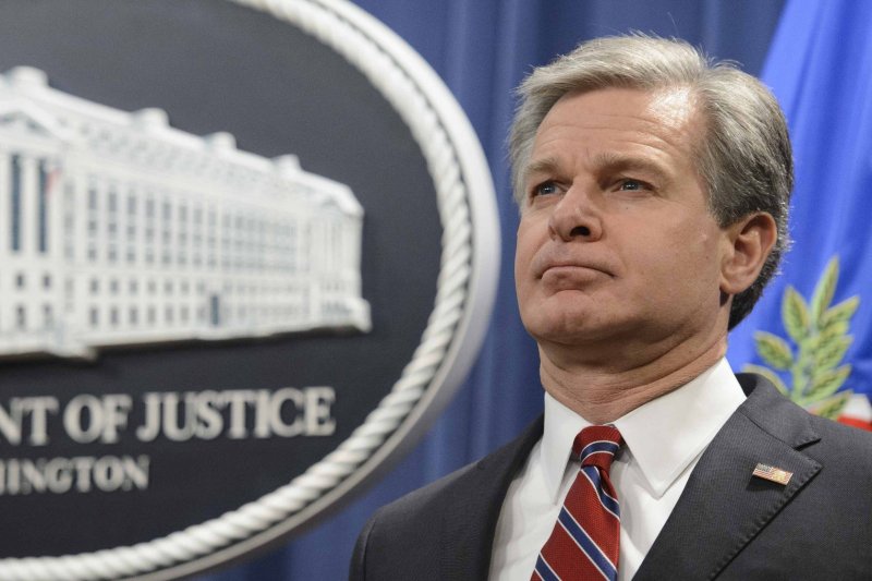 FBI Director Christopher Wray suggested more should be done to put a check on China's "hacking program," which was being used "to advance the repression that occurs not just back home in mainland China but increasingly as a product that they export around the world." File photo by Bonnie Cash/UPI