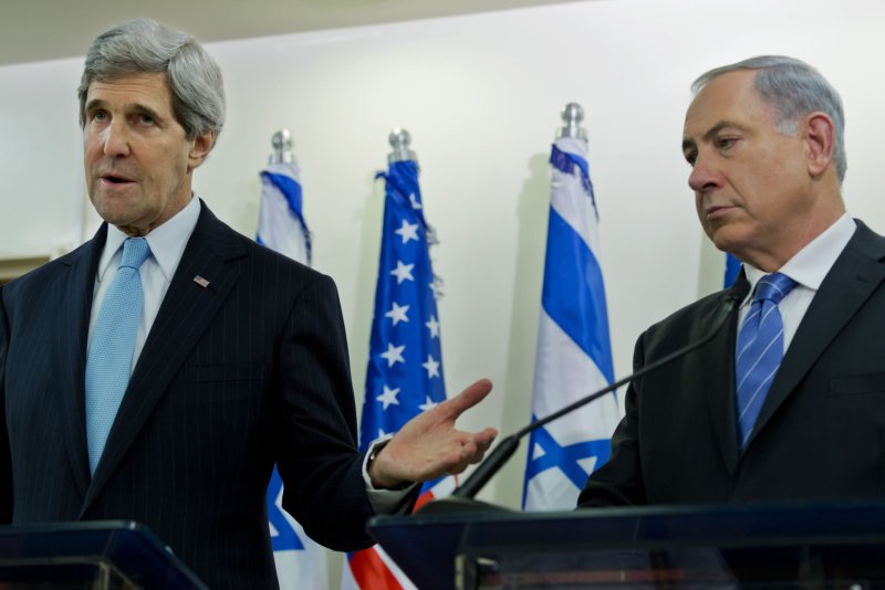 U.S. Secretary of State John Kerry, seen alongside Israeli Prime Minister Benjamin Netanyahu during a meeting in 2014, on Wednesday said Netanyahu's support of Israeli settlements on Palestinian territory endangers the possibility of a two-state solution to resolve the Israeli-Palestinian conflict. File Photo by Jim Hollander/Pool/UPI | <a href="/News_Photos/lp/6a6bc2029007b67d928e21046c108f43/" target="_blank">License Photo</a>