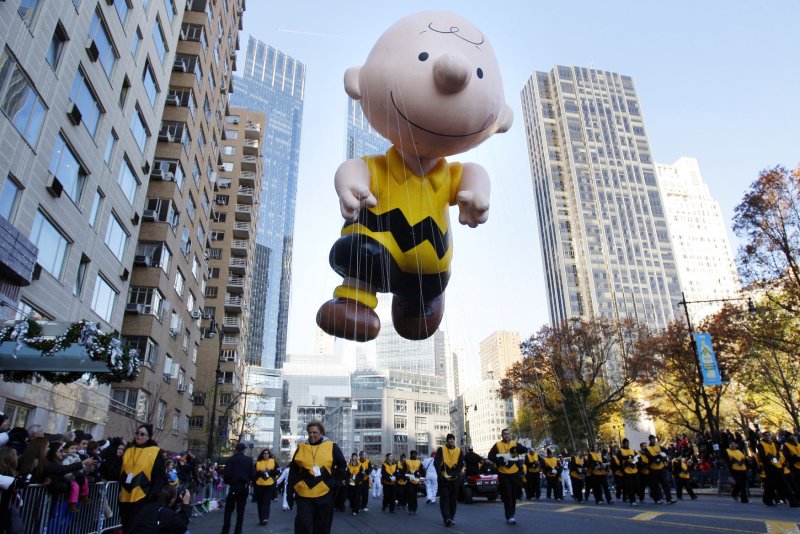 The Charlie Brown balloon floats down the parade route at the Macy's 86th Annual Thanksgiving Day Parade in New York City on November 22, 2012. On October 3, 1950, the "Peanuts" comic strip by Charles M. Schulz was published for the first time. File Photo by John Angelillo/UPI | <a href="/News_Photos/lp/aa40a9e084c6228e604042f5defbfc99/" target="_blank">License Photo</a>
