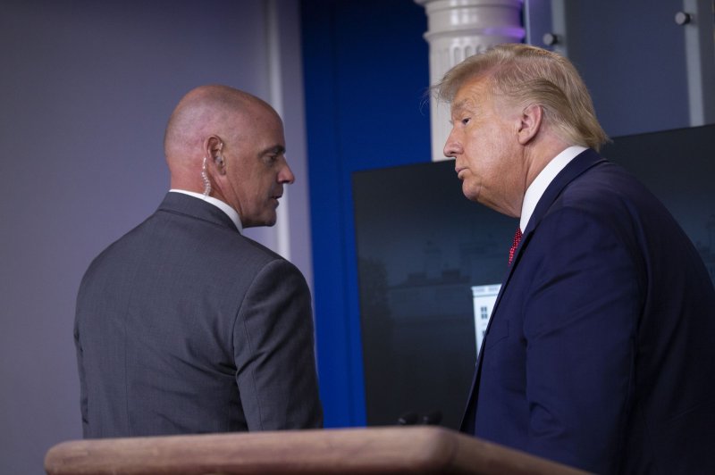 President Donald Trump was removed from the White House Briefing Room by a U.S. Secret Service agent during a press briefing Monday. Photo by Stefani Reynolds/UPI