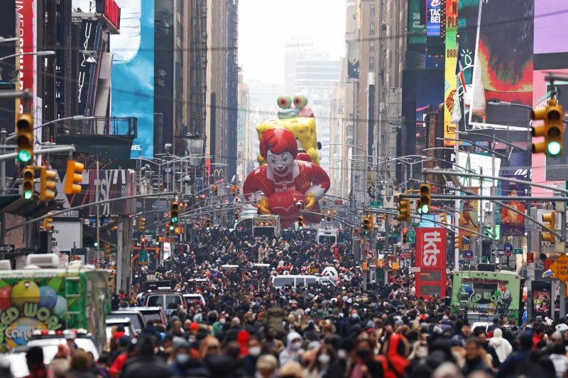 The Ronald McDonald balloon moves down 7th Avenue as spectators depart from the 95th Macy's Thanksgiving Day Parade in New York City on November 25, 2021. File Photo by John Angelillo/UPI | <a href="/News_Photos/lp/64b11c006610b0ca4027eca6dcd5fcda/" target="_blank">License Photo</a>