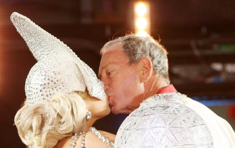 Lady Gaga and New York City Mayor Michael Bloomberg kiss at the stroke of midnight during the New Year's Eve celebration in Times Square on January 1, 2012 in New York City. UPI /Monika Graff