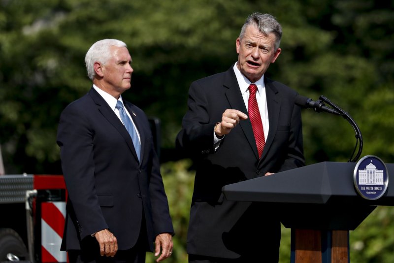 Idaho Governor Brad Little (R), shown here meeting with then Vice President Mike Pence in 2020, signed a bill authorizing firing squads as an alternate execution method to lethal injection. File Photo by Al Drago/UPI