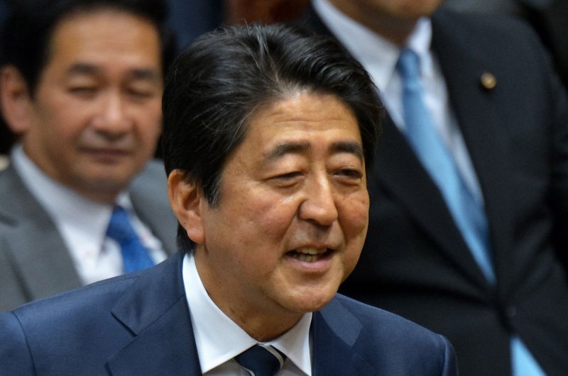 Japan's Shinzo Abe criticized for 'golf summit' with Donald Trump