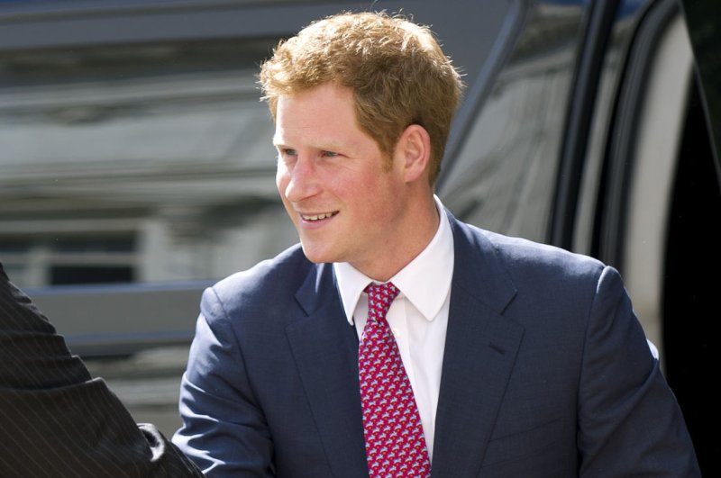 Prince Harry arrives on Capitol Hill to tour a photography exhibit on May 9, 2013 in Washington, D.C. (File/UPI/Kevin Dietsch)