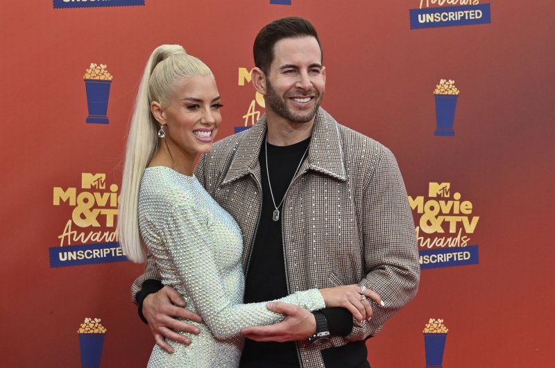 Heather Rae Young (L) and Tarek El Moussa are expecting their first child together. File Photo by Jim Ruymen/UPI | <a href="/News_Photos/lp/7c97c61751be0c77981ac58fc04ad9e8/" target="_blank">License Photo</a>