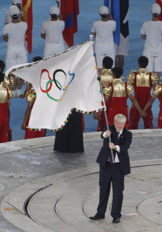 London's Mayor Boris Johnson waves the Olympic flag during the closing ceremonies for the 2008 Summer Olympics at the National Stadium in Beijing on August 23, 2008. (UPI Photo/Terry Schmitt)