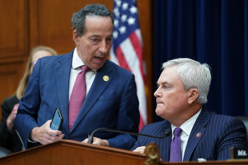 House Oversight and Accountability Committee Chairman James Comer (R), R-Ky., speaks with Rep. Jamie Raskin, D-Md., during a hearing on an impeachment inquiry into President Joe Biden on Thursday. Photo by Bonnie Cash/UPI