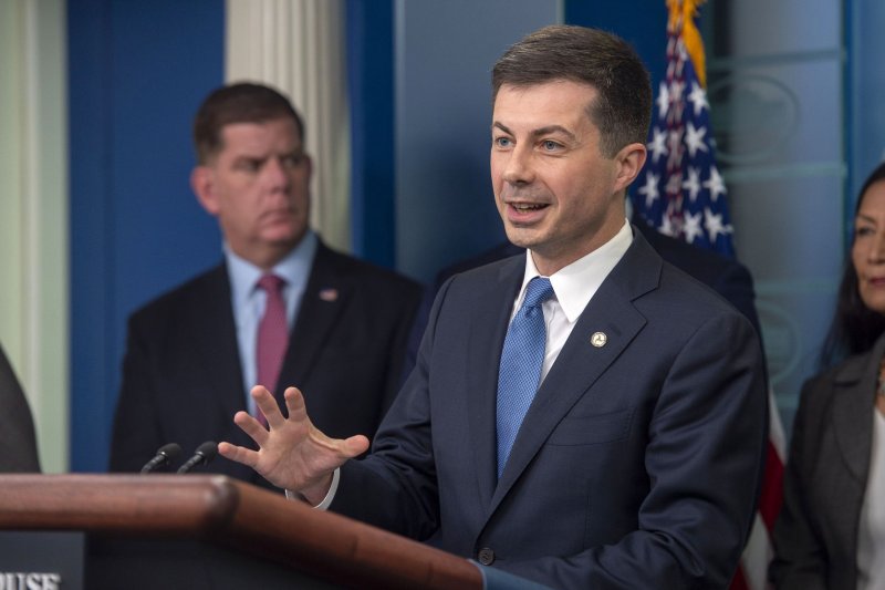 Secretary of Transportation Pete Buttigieg, shown here in May, said Monday a new proposed rule would require airlines to be transparent with customers about the fees they charge. File Photo by Bonnie Cash/UPI | <a href="/News_Photos/lp/269c7eadc522560dbfbef2f9e563614e/" target="_blank">License Photo</a>