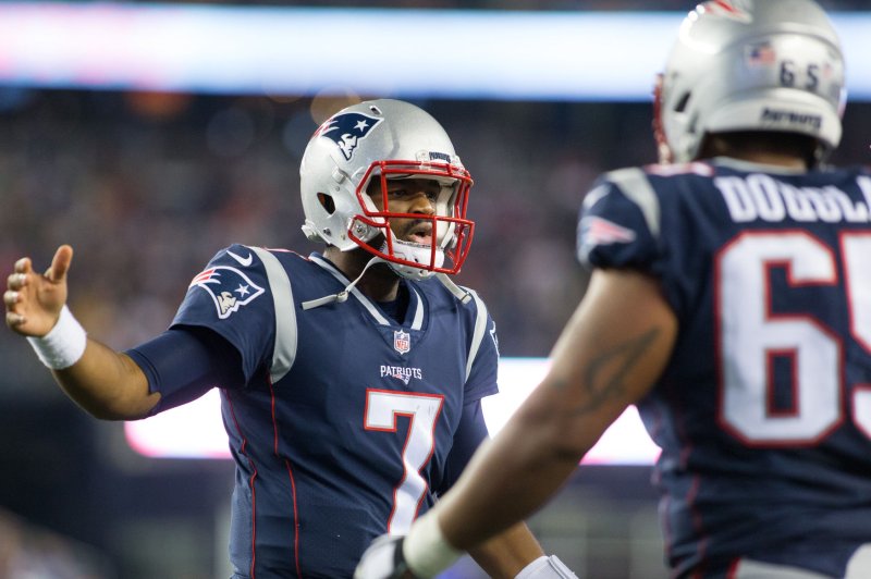 Former New England Patriots and current Indianapolis Colts quarterback Jacoby Brissett (7) gives a high five to offensive lineman Jamil Douglas (65) after Brissett threw a touchdown pass in the second quarter of a preseason game against the New York Giants on August 31, 2017 at Gillette Stadium in Foxborough, Massachusetts. File photo by Matthew Healey/UPI