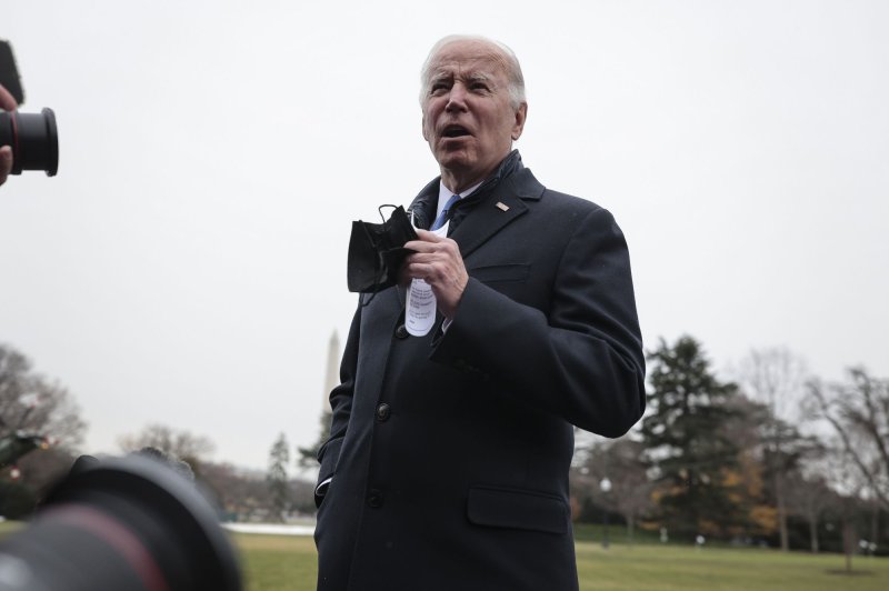 President Joe Biden talks to reporters on the South Lawn of the White House before boarding Marine One on Wednesday. Photo by Oliver Contreras/UPI