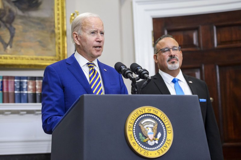 President Joe Biden gives remarks with Secretary of Education Miguel Cardona after announcing a federal student loan relief plan that includes forgiving up to $20,000 for some borrowers and extending the payment freeze on August 24. Photo by Bonnie Cash/UPI | <a href="/News_Photos/lp/920c34a2d3ba63cd0cb490c19ca2d1ed/" target="_blank">License Photo</a>