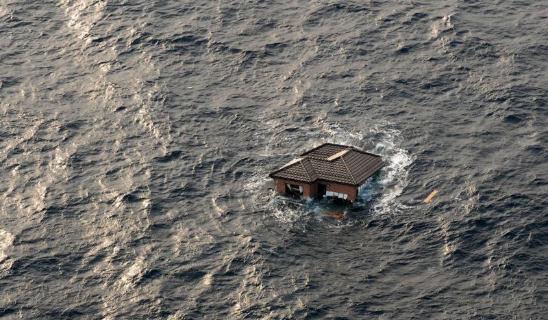 A house is seen adrift in the Pacific Ocean near Sendai, Japan, March 13, 2011, two days after a massive earthquake and tsunami. UPI/Dylan McCord/U.S. Navy