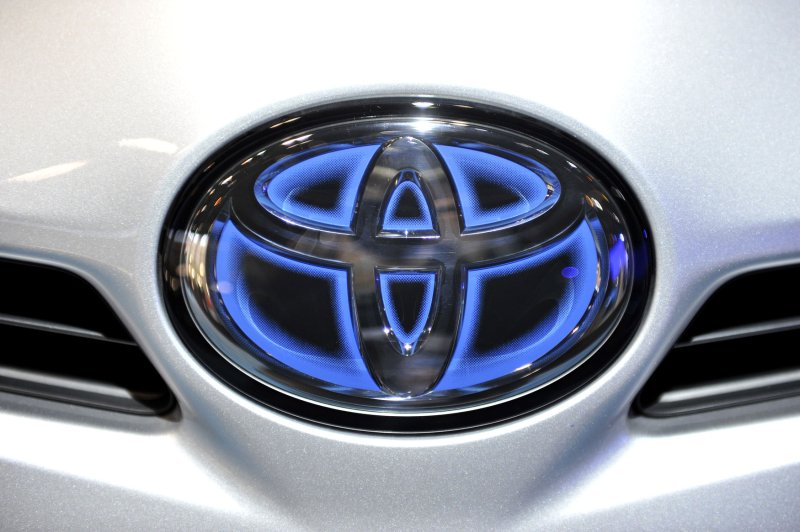 The Toyota logo is seen on a Prius Plug-In Hybrid at the company's display during the Chicago Auto Show at McCormick Place on February 9, 2012 in Chicago. UPI/Brian Kersey