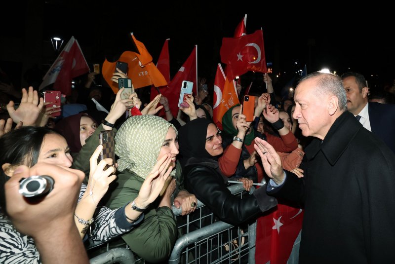 Turkish President Recep Tayyip Erdogan greets supporters outside his residence located in the Uskudar district of Kisikli Istanbul, Turkey, on Sunday. Photo by Turkish President Press Office/UPI