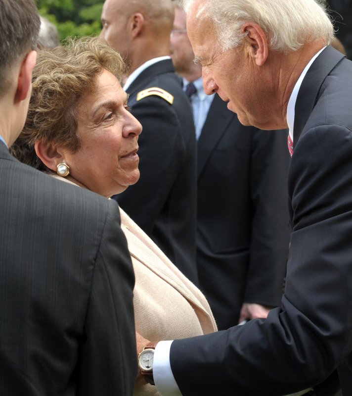 Vice President Joe Bide greets Donna Shalala, former Health and Human Services Secretary, after U.S. President Barack Obama signed the Family Smoking Prevention and Tobacco Control Act in the Rose Garden of the White House in Washington on June 22, 2009. (UPI Photo/Roger L. Wollenberg)