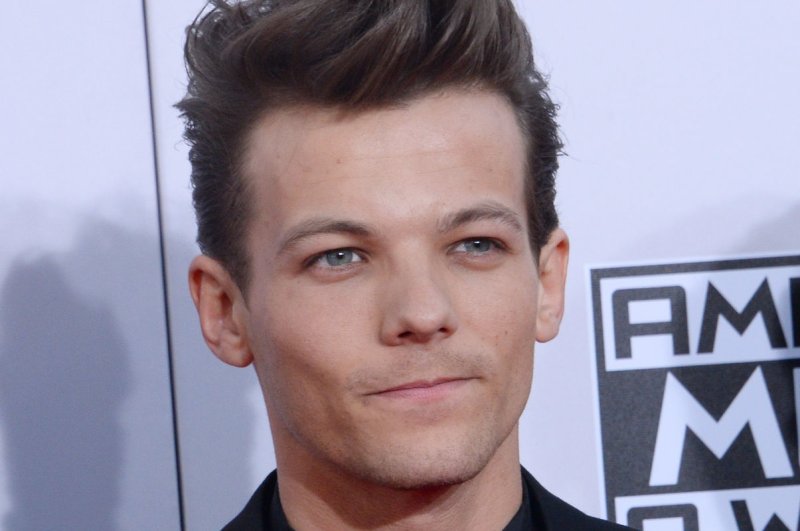 Louis Tomlinson released "Out of My System," a new song from his album "Faith in the Future," and announced a new tour. File Photo by Jim Ruymen/UPI